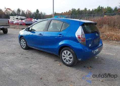 2014 Toyota Prius C One from USA, damaged, VIN JTDKDTB38E1566530